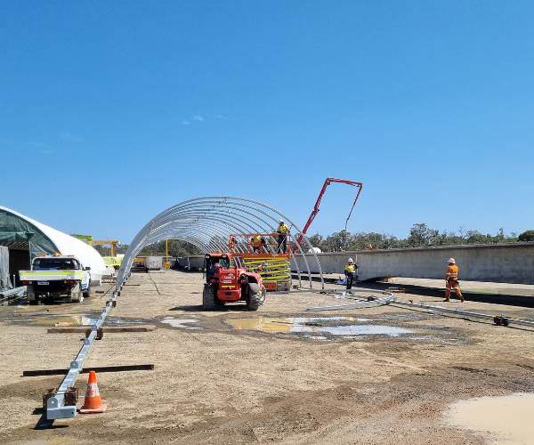 Promet Service Team disassembling a fabric dome shelter for site relocation